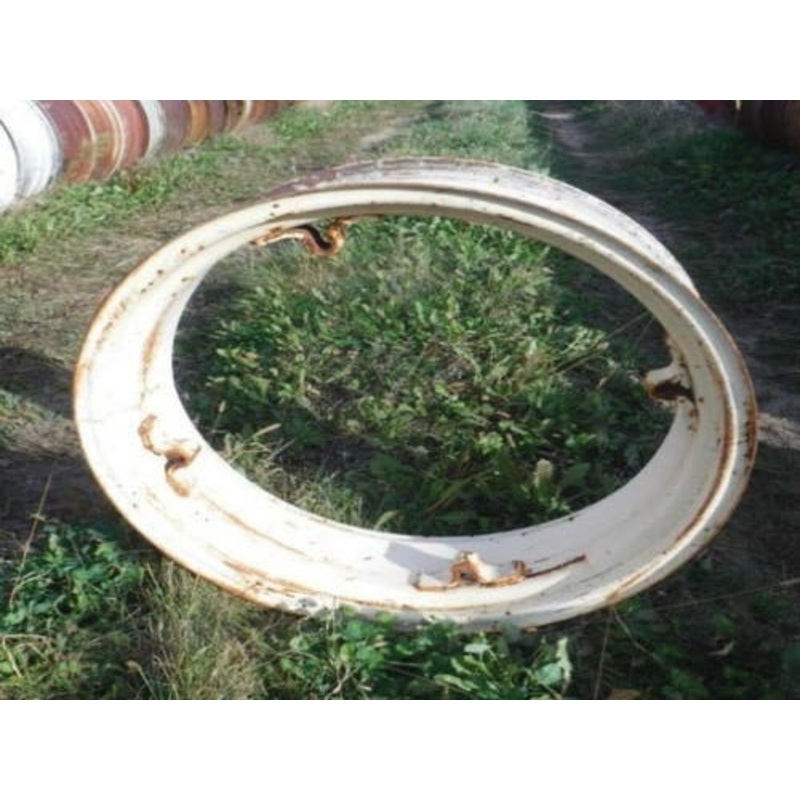 Used 9" x 28" 4 Loop Rim fits Belarus 250AS